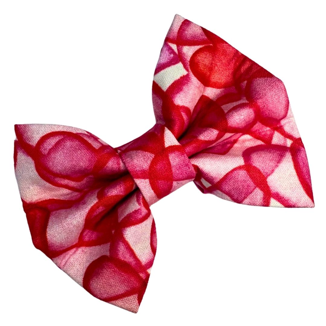 Red and white heart patterned bow
