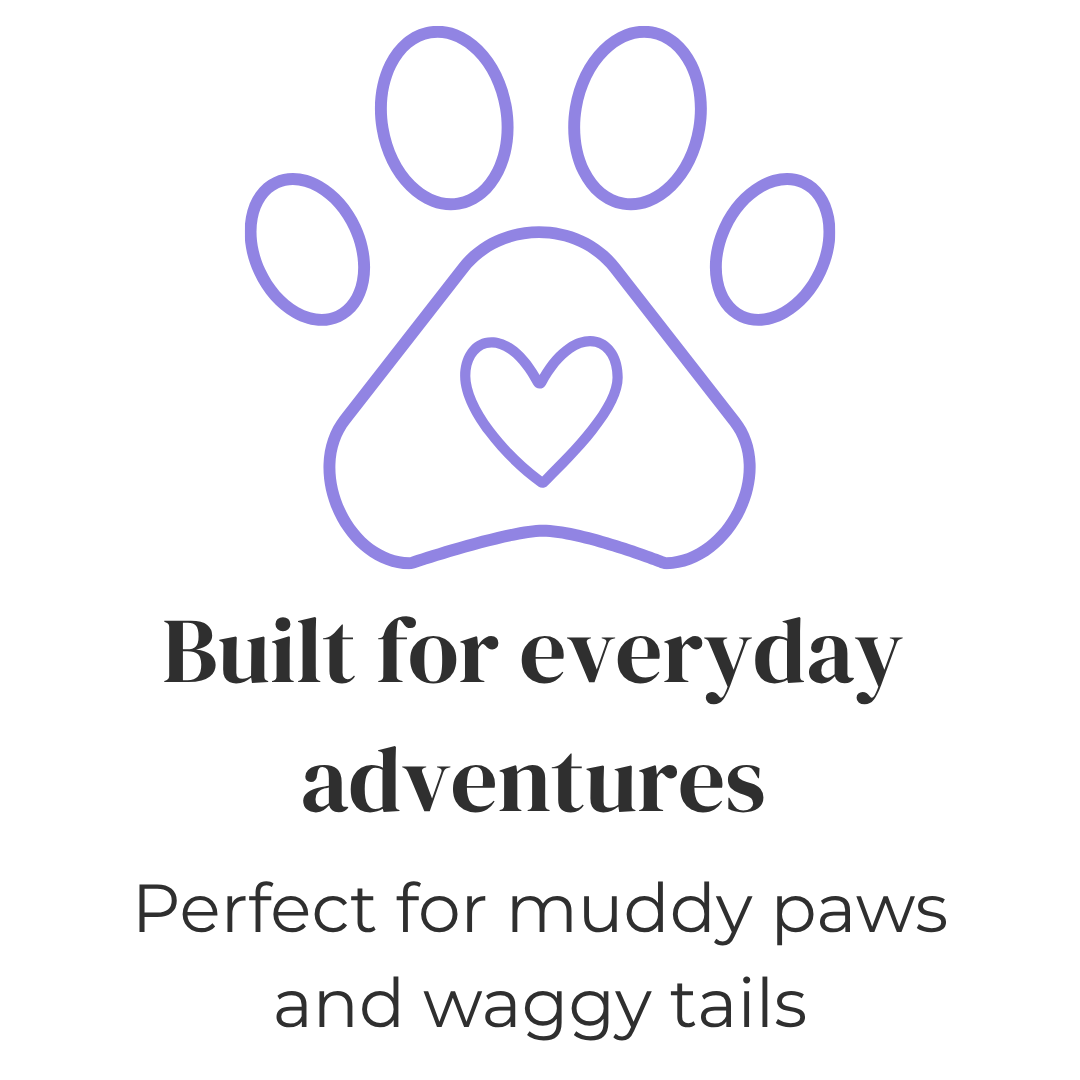 Purple paw print with a heart in the centre with text everyday adventures and muddy paws.