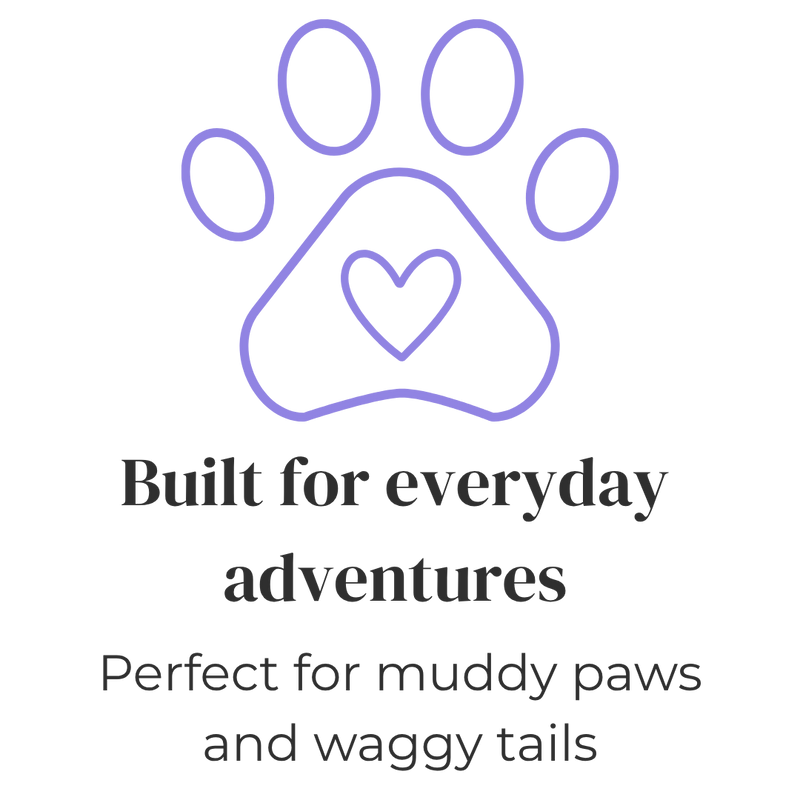 Purple paw print with a heart in the centre with text everyday adventures and muddy paws.