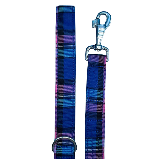 A handmade blue, pink and black tartan dog lead with a silver metal hardware and a large swivel clip.