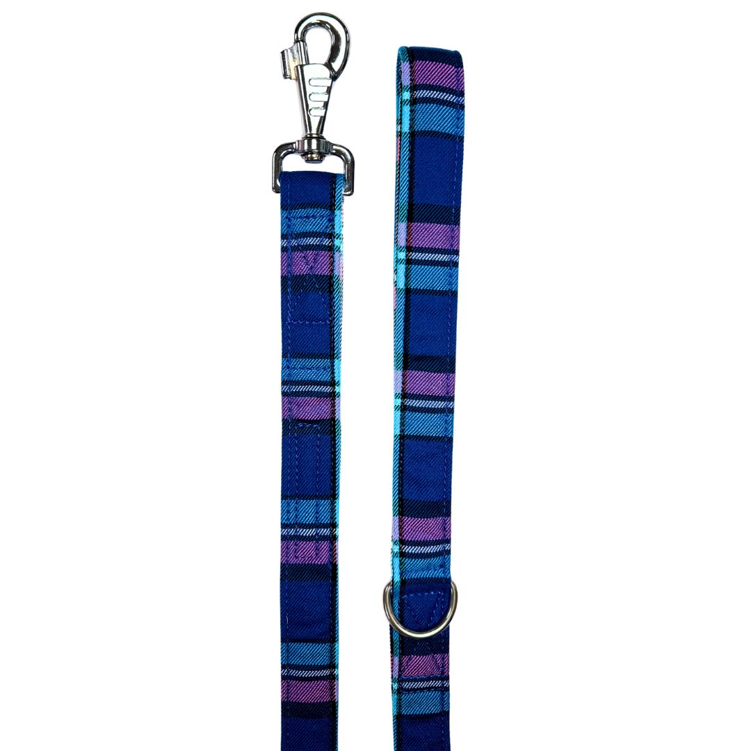 A handmade blue, pink and black tartan dog lead with a silver metal hardware and a large swivel clip.