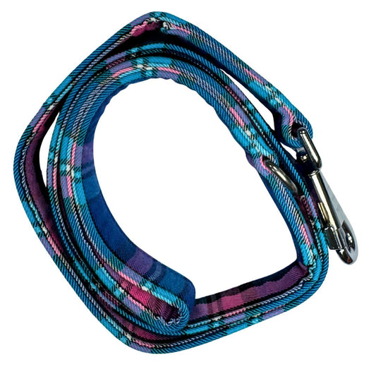 Top view of a handmade blue, pink and black tartan dog lead with a silver metal hardware and a large swivel clip.