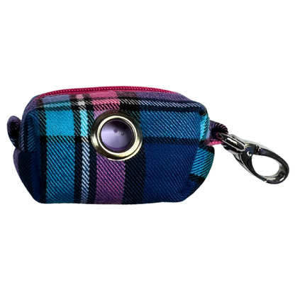 A Cambridge Tartan fabric poo bag holder with a pink zip and metal accessories.