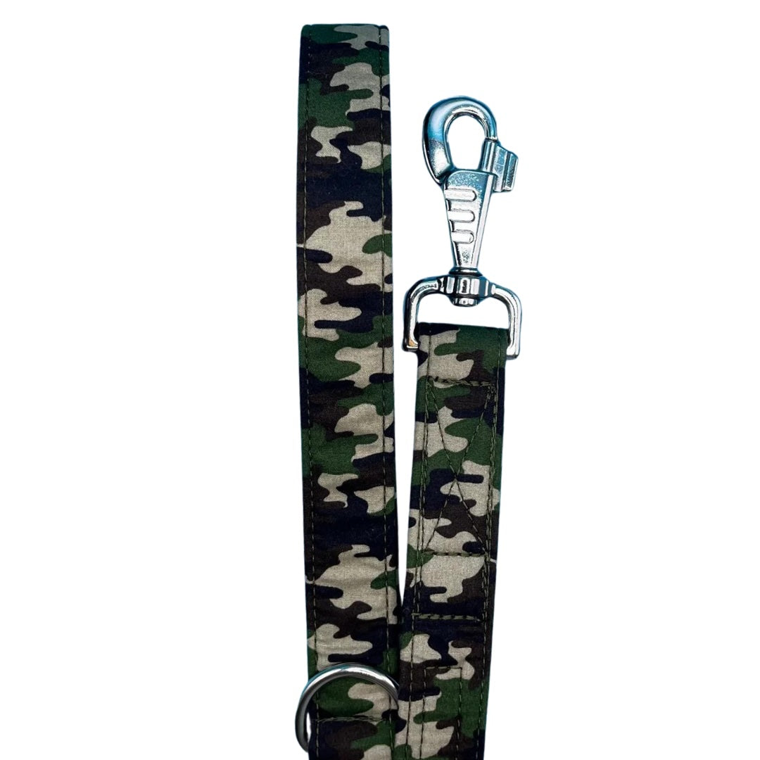 A camo pattern dog lead with a large swivel clip and metal D ring.