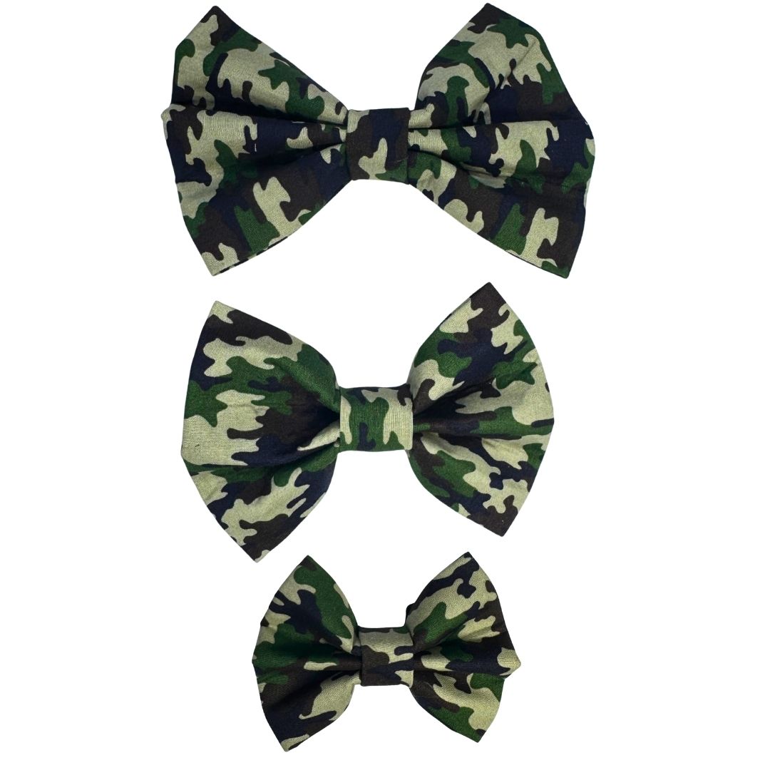 Three green camouflage-patterned dog bows