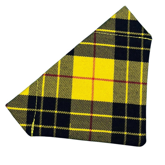 A yellow, black, and red tartan bandana designed for dogs.