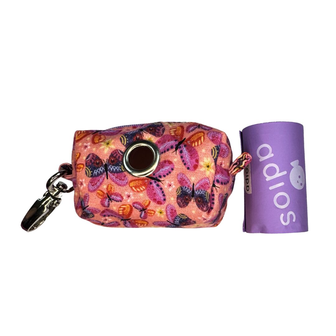 Butterfly-patterned poo bag holder with a a roll of adios poo bags