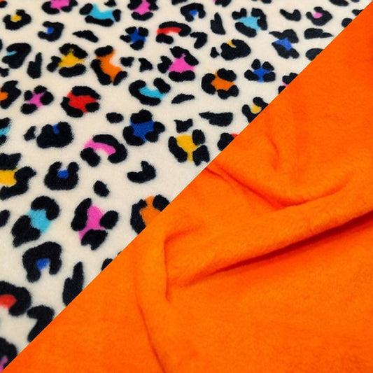 Multicoloured leopard print fabric and bright orange fabric.