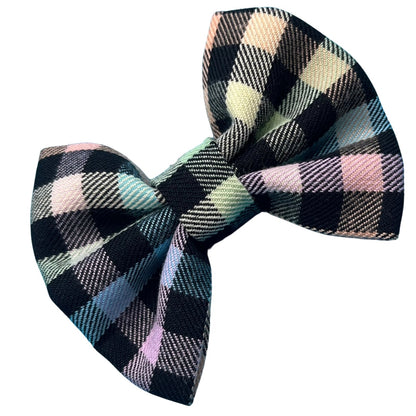 A multicoloured pastel checkered dog bow tie with 