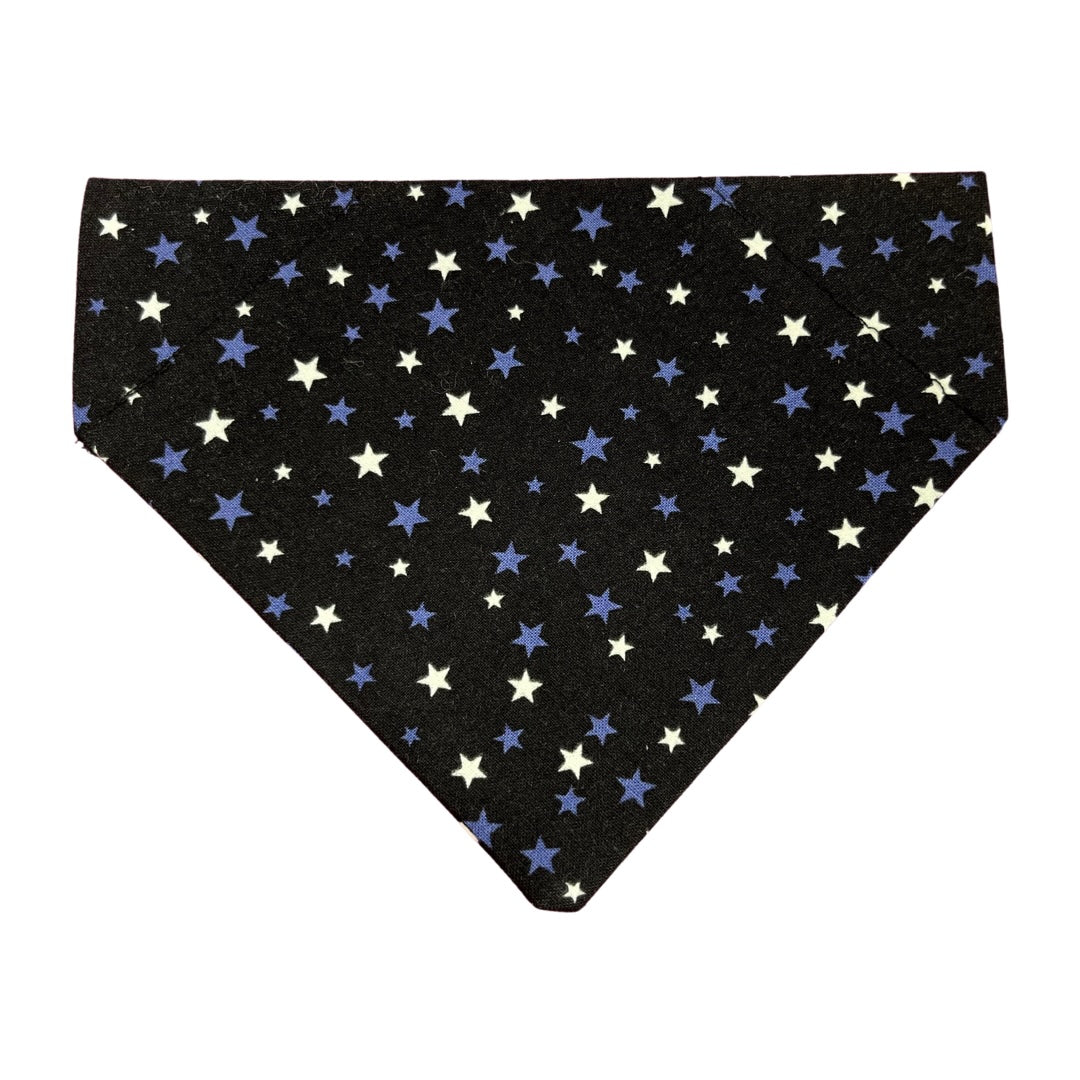 A glow-in-the-dark star dog bandana perfect for Halloween or autumn 