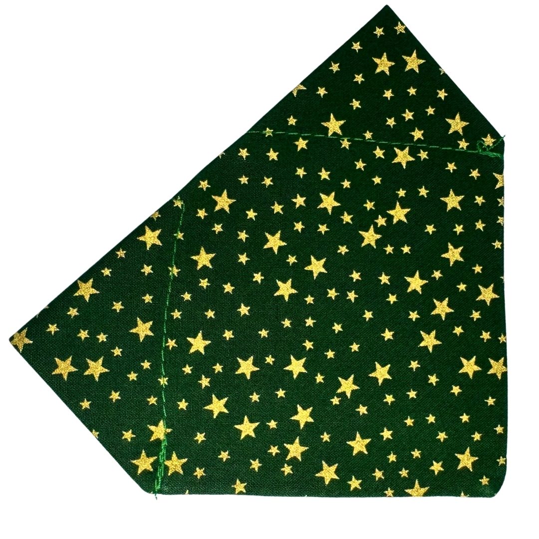 Green fabric dog bandana with gold star pattern