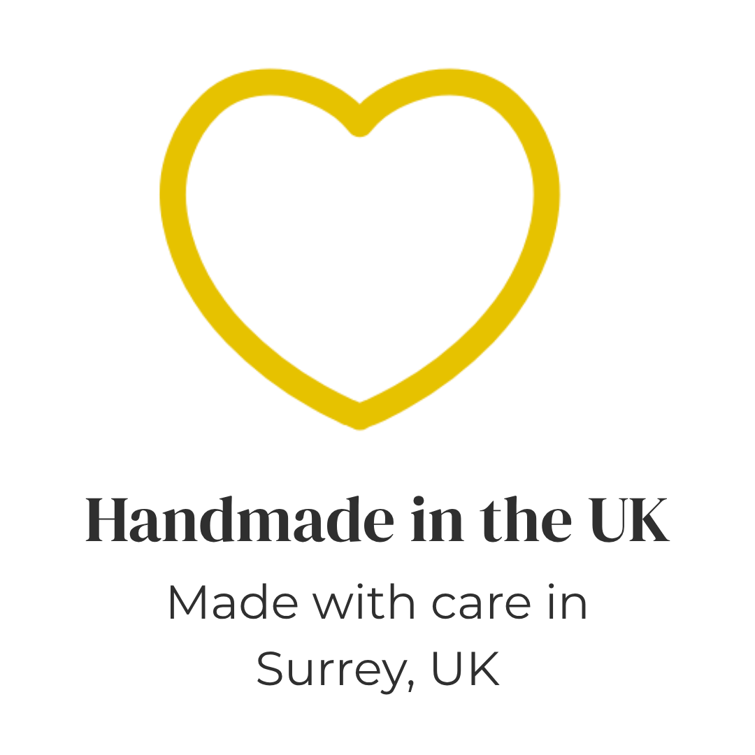Yellow heart outline with text 'Handmade in the UK, Made with care in Surrey, UK'