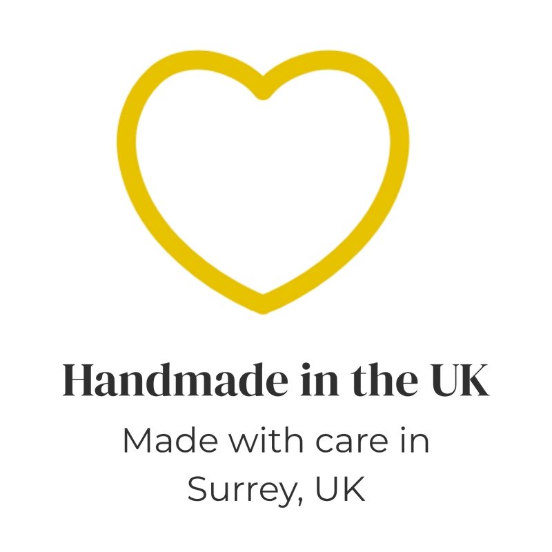Yellow heart outline with text 'Handmade in the UK, Made with care in Surrey, UK'