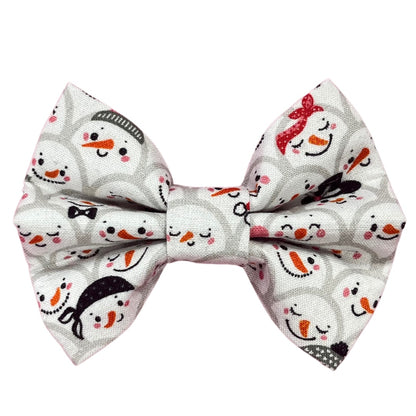 A bow tie with a Christmas-themed pattern featuring snowmen, designed for pets.