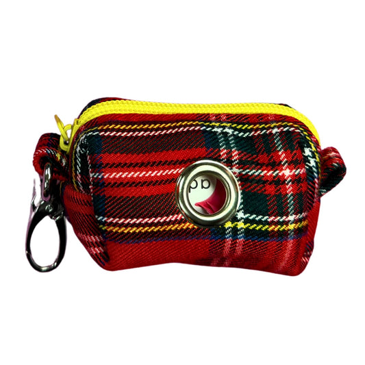 Red plaid patterned poo bag holder with a keychain and yellow zipper pull