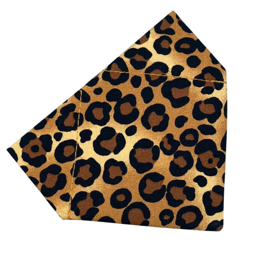 A brown and black leopard print dog bandana made of cotton