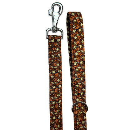 Dog leash with a ladybird pattern showing the clip and handle
