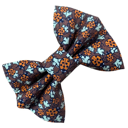 Brown and red ladybird patterned bow for dogs and cats.