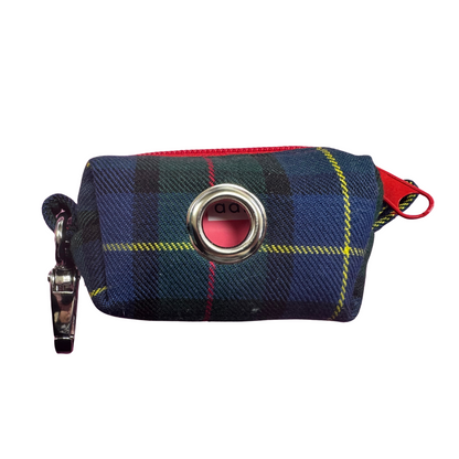 Blue and Green Tartan patterned pouch with a close up of the poo bag dispatching hole and red zip on a white background