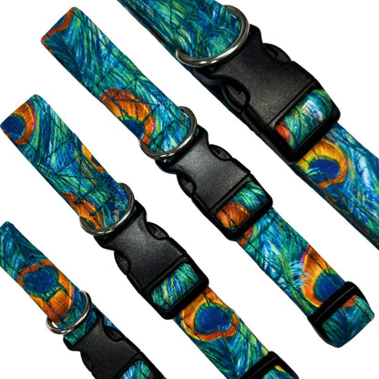 Close up of a set of colourful peacock feather-patterned dog collars with black buckles