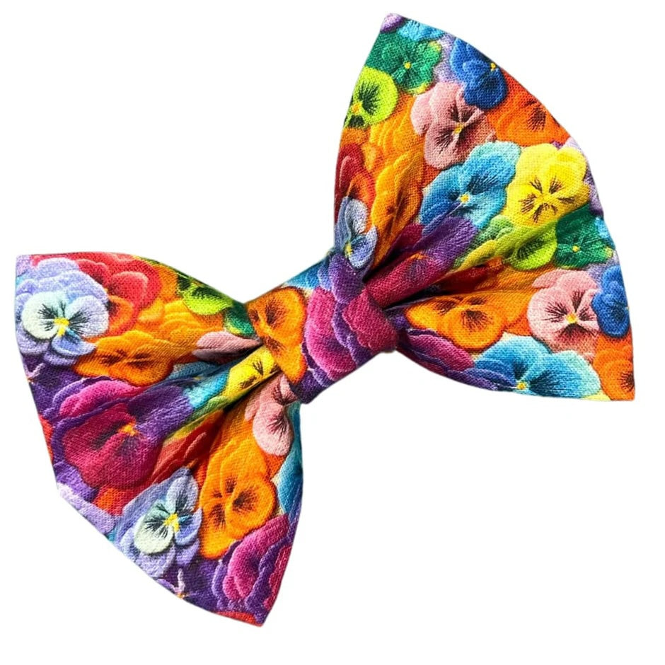 A colourful pansy patterned floral dog bow tie