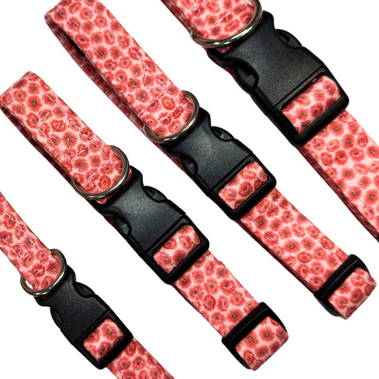 Set of pink floral-patterned dog collars with black buckles