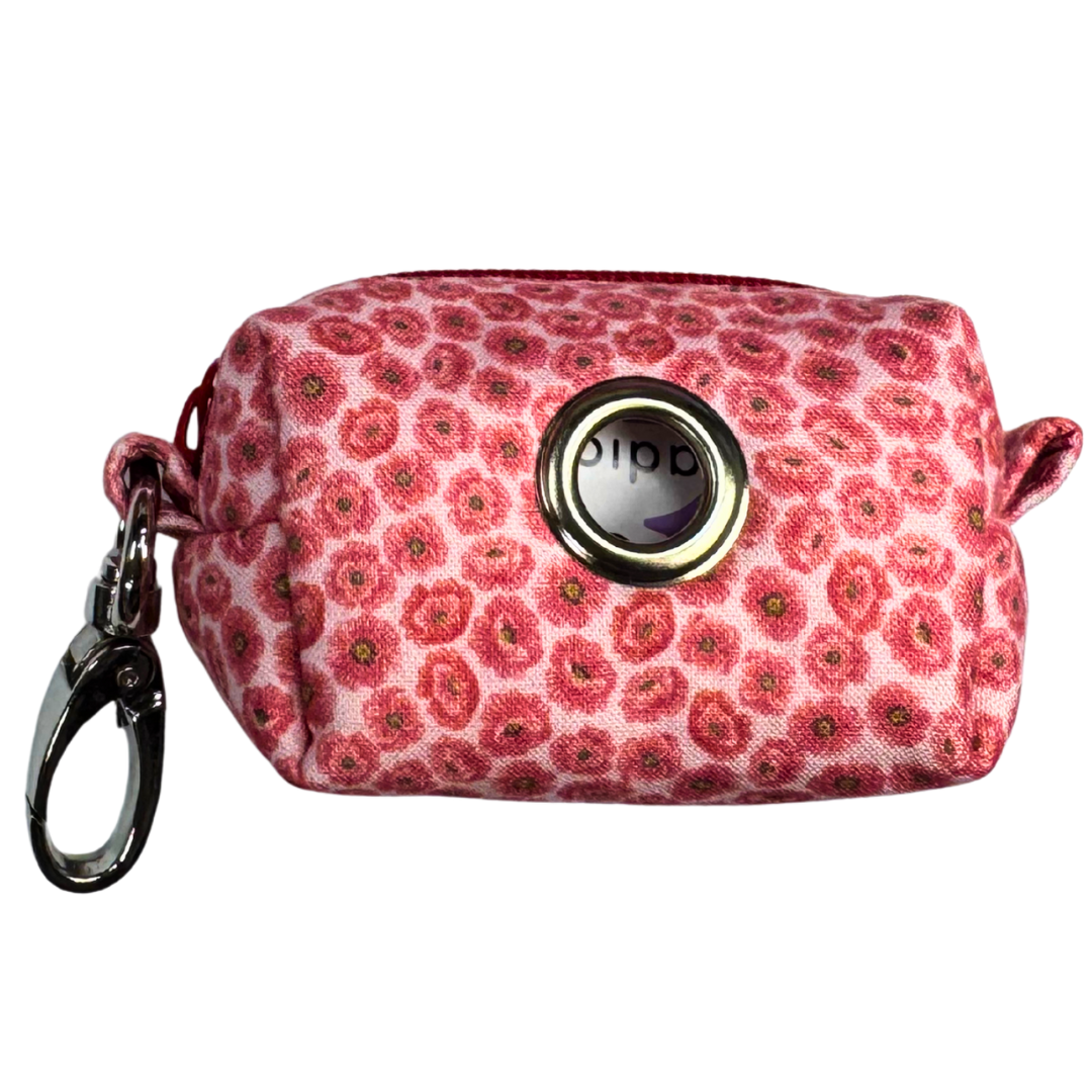 Floral-patterned poo bag holder with a keychain to attach to a lead