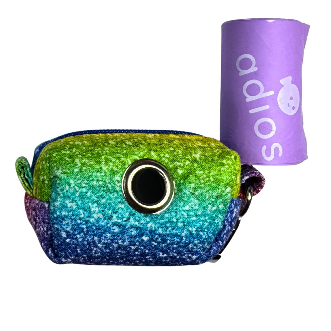 Colourful glittery poo bag holder with a roll of purple adios poo bags