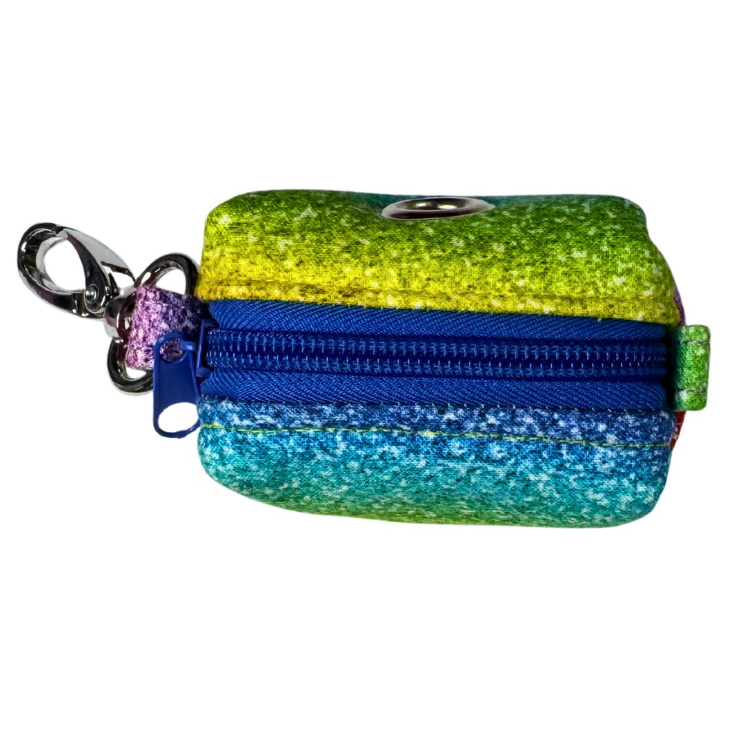 Colourful glittery poo bag holder with a blue zipper and keychain clip