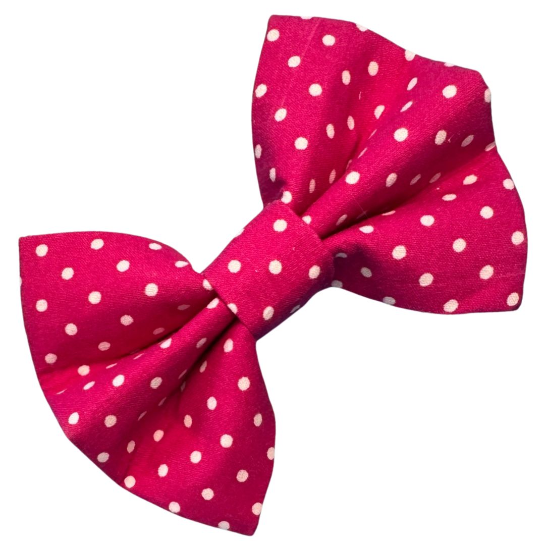 Pink bow with white polka dots