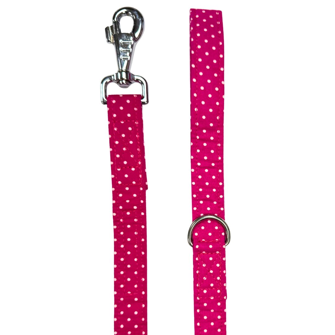 Pink dog leash with white polka dots and metal clip