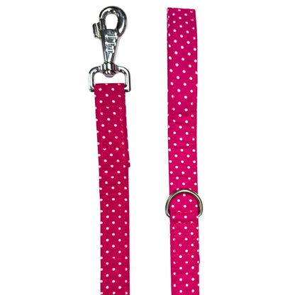 Pink dog leash with white polka dots and metal clip