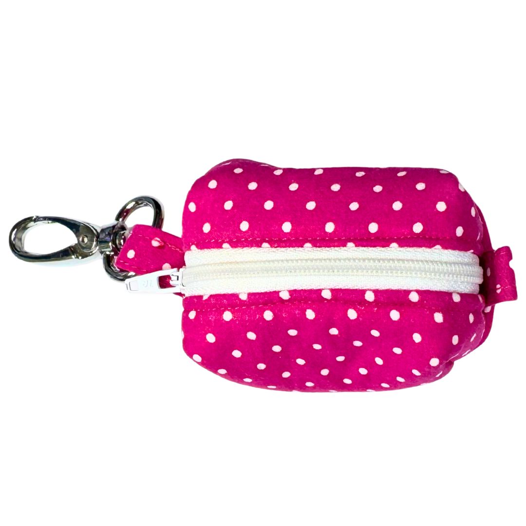 Pink polka dot pouch with a white zipper