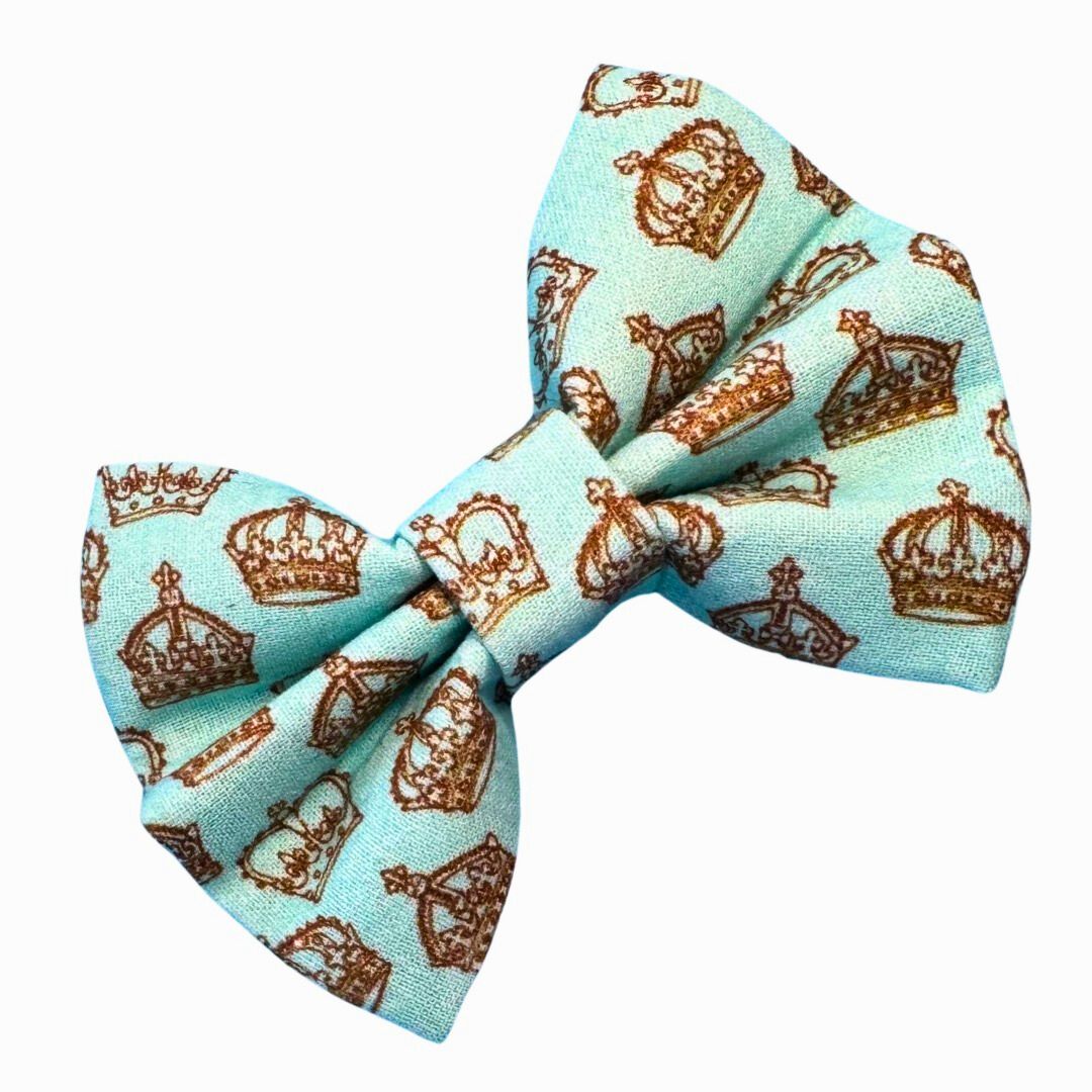 Light Blue dog bow with a brown crowns pattern