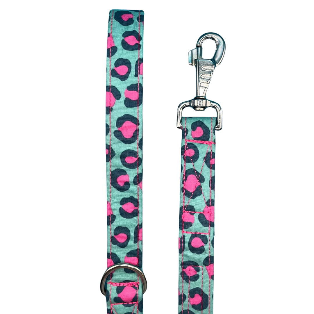 A leopard print dog lead with a large swivel clip and metal D ring