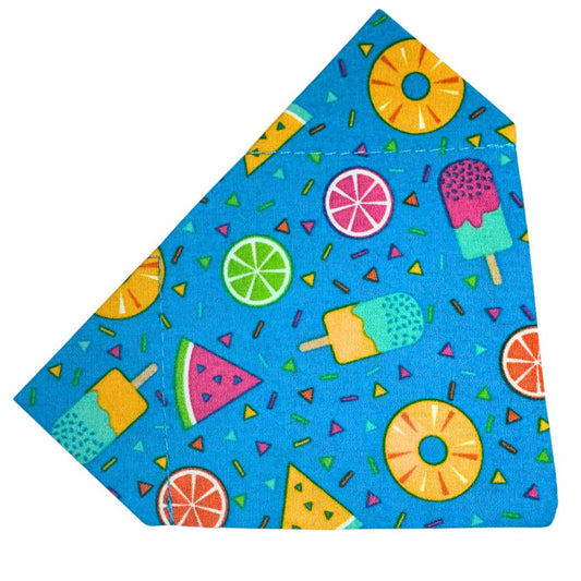 Colourful fabric bandana with summer-themed patterns on a blue background