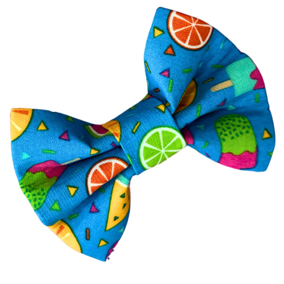 Colourful dog bow with summer themed pattern