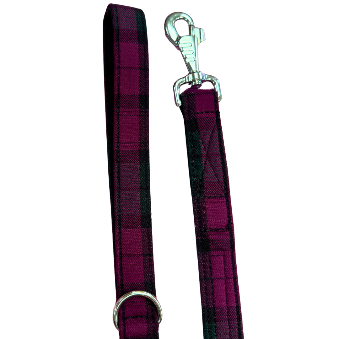 Tartan dog leash in plum and green with metal clip.