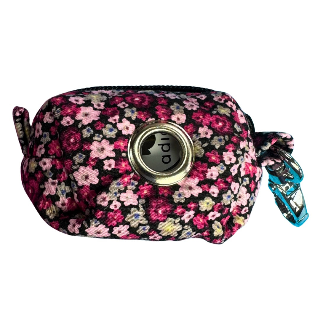 Cherry Blossom floral patterned pet waste bag dispenser with adios poo bags inside on a white background