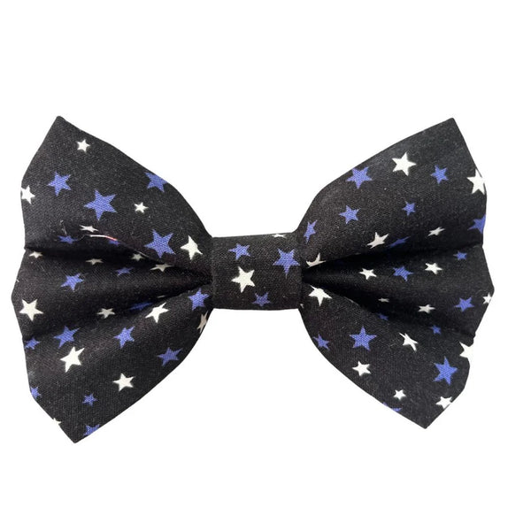 Black bow tie with glow-in-the-dark star pattern on a white background